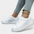 Vita sneakers i skinn