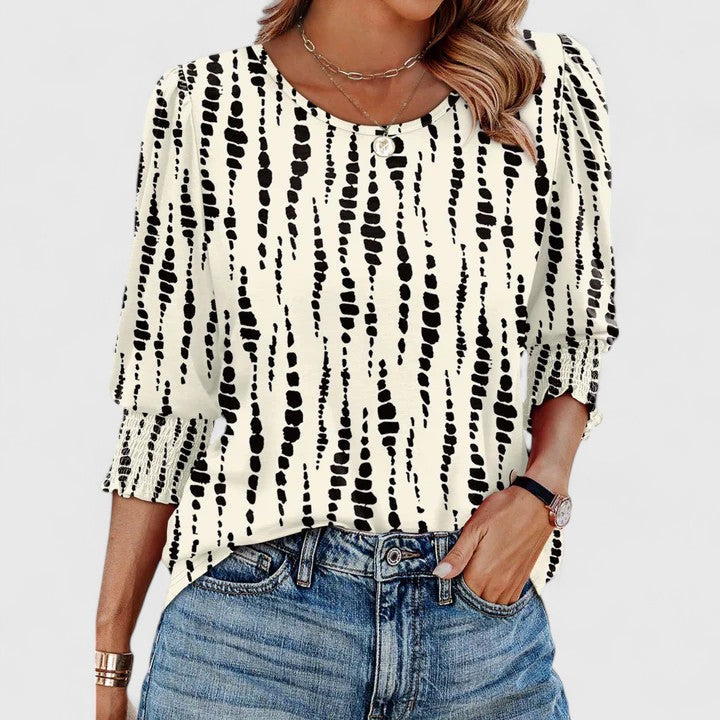 Solara – Elegant smockad topp