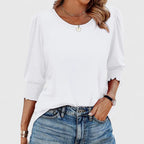 Solara – Elegant smockad topp
