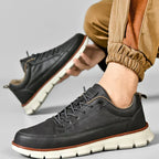 Stödjande sneakers i läder