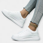 Vita sneakers i skinn