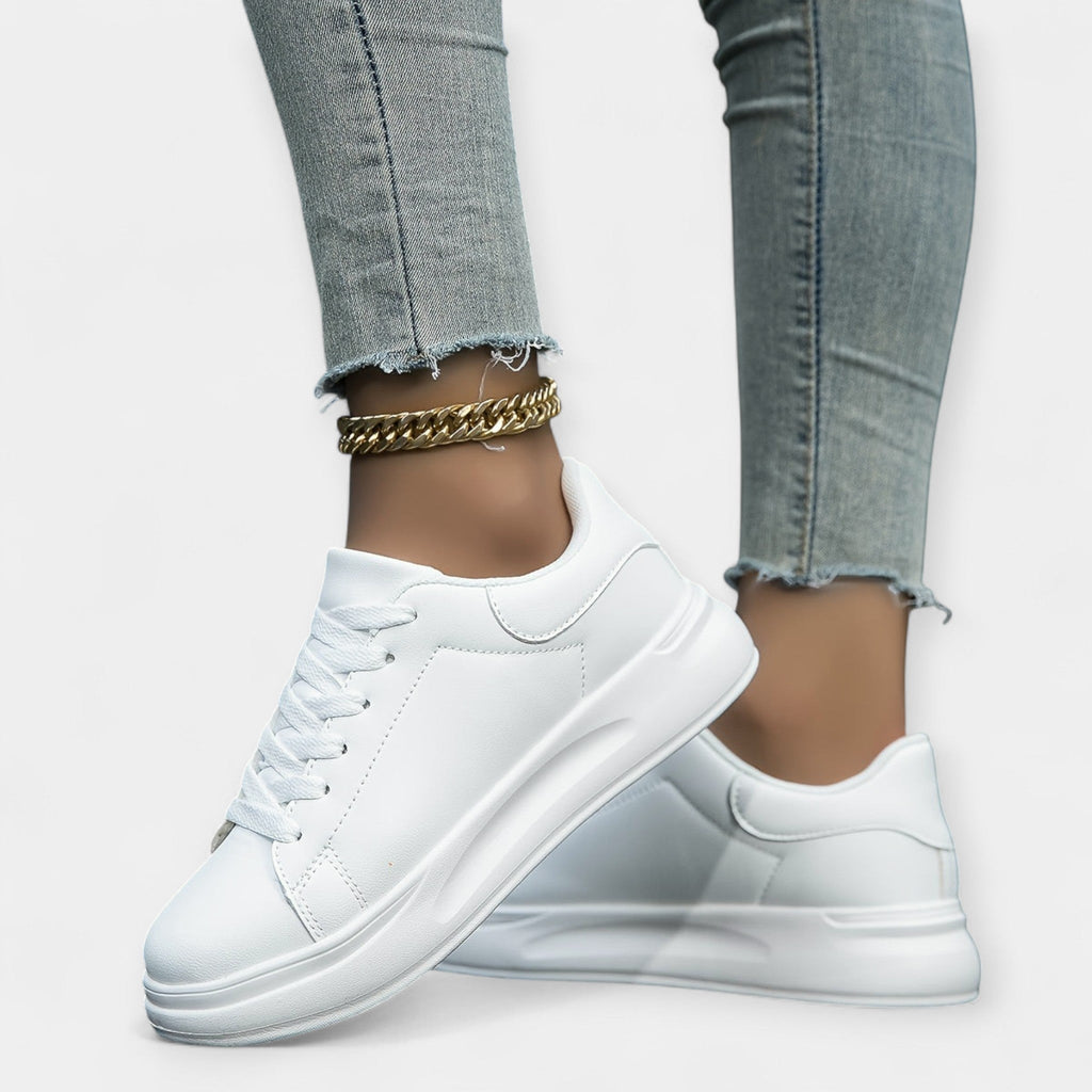 Vita sneakers i skinn