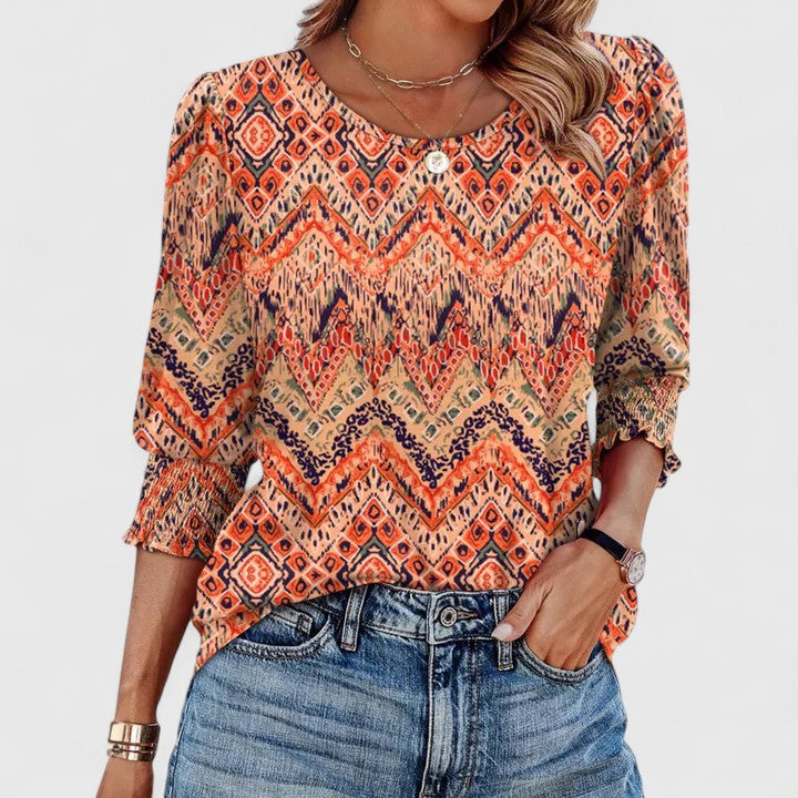 Solara – Elegant smockad topp