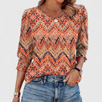 Solara – Elegant smockad topp
