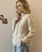 Elegant stickad cardigan med volanger