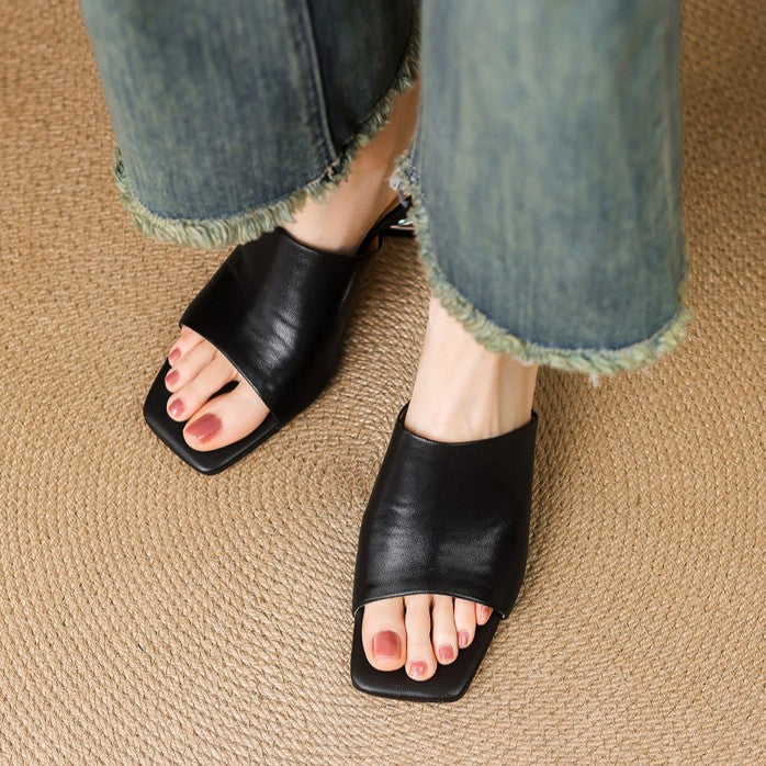 Odile | Mules med skulptural klack