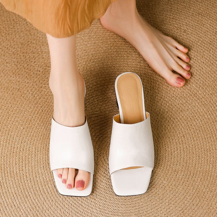 Odile | Mules med skulptural klack