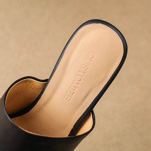 Odile | Mules med skulptural klack