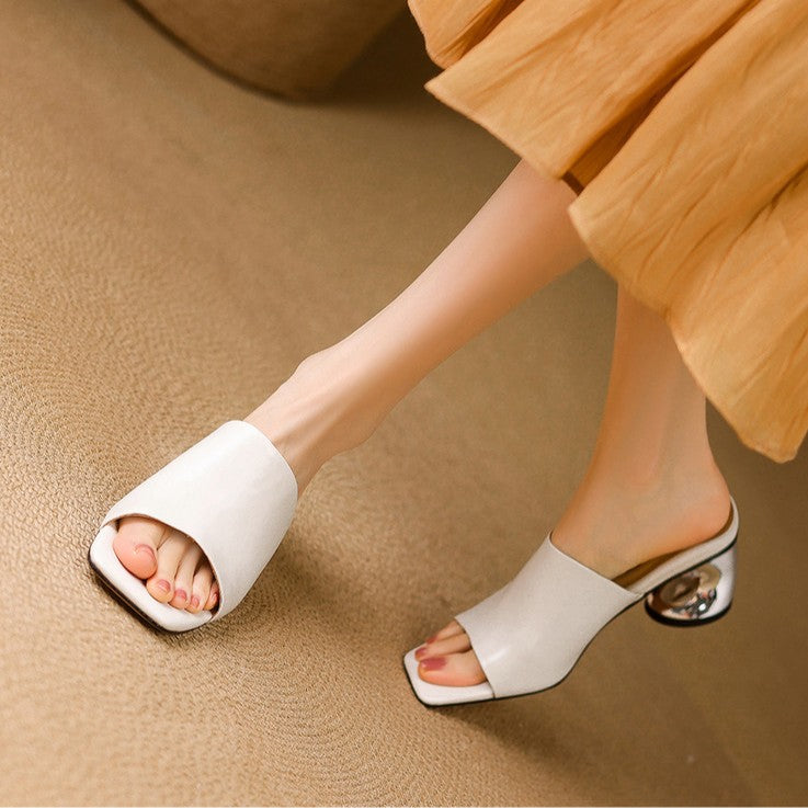 Odile | Mules med skulptural klack