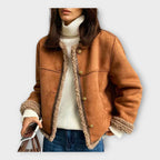 Elegant skinnjacka med varmt foder och klassisk stil