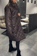 Kynzi – Elegant Vadderad Kappa
