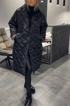 Kynzi – Elegant Vadderad Kappa
