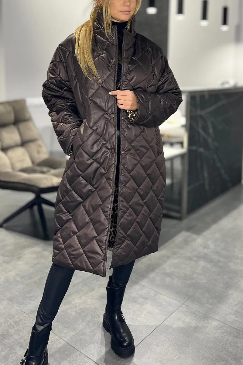 Kynzi – Elegant Vadderad Kappa