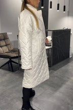 Kynzi – Elegant Vadderad Kappa
