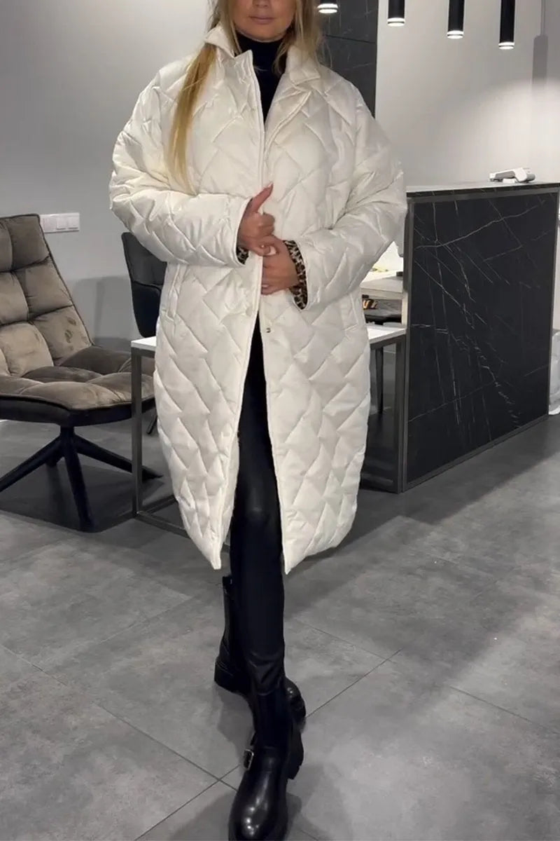 Kynzi – Elegant Vadderad Kappa