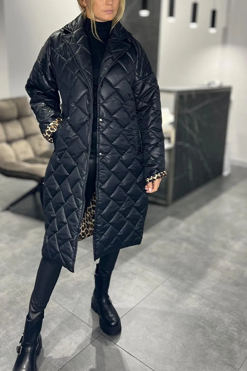 Kynzi – Elegant Vadderad Kappa