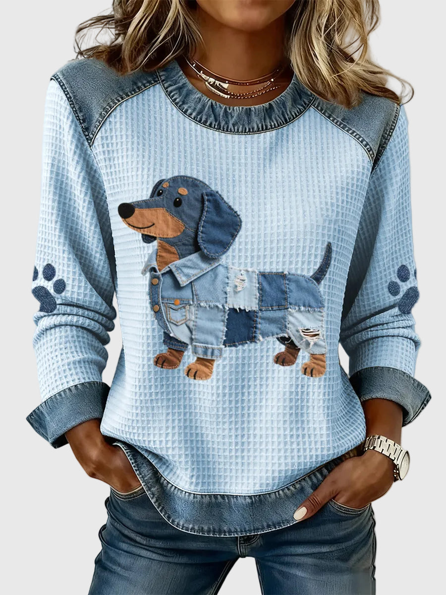Nuria – tröja med taxmotiv och patchwork i denim